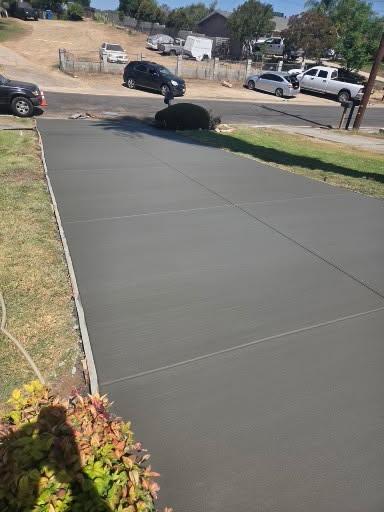 New concrete driveway viewed toward the street